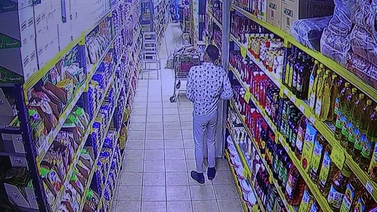 Kaşla göz arasında ayçiçek yağını pantolonun içine koyarak böyle çaldı!