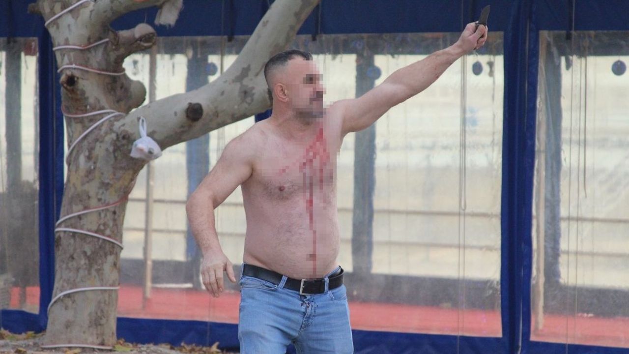 Yıkım yüzünden : Dükkanlar ateşe verildi,bir kişi kendini bıçakladı!