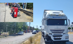 Tırın altında kalan motorlu can verdi!