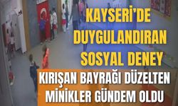 Kayseri'de kırışan bayrağı düzelten minikler duygulandırdı