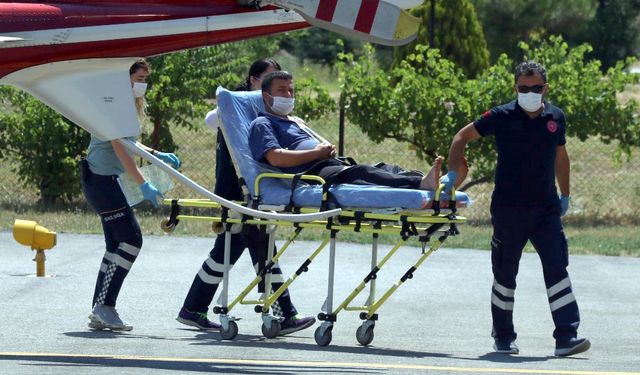 Motorlu testereyle omzunu kesti, ambulans helikopterle hastaneye götürüldü