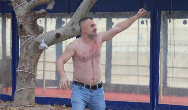 Yıkım yüzünden : Dükkanlar ateşe verildi,bir kişi kendini bıçakladı!